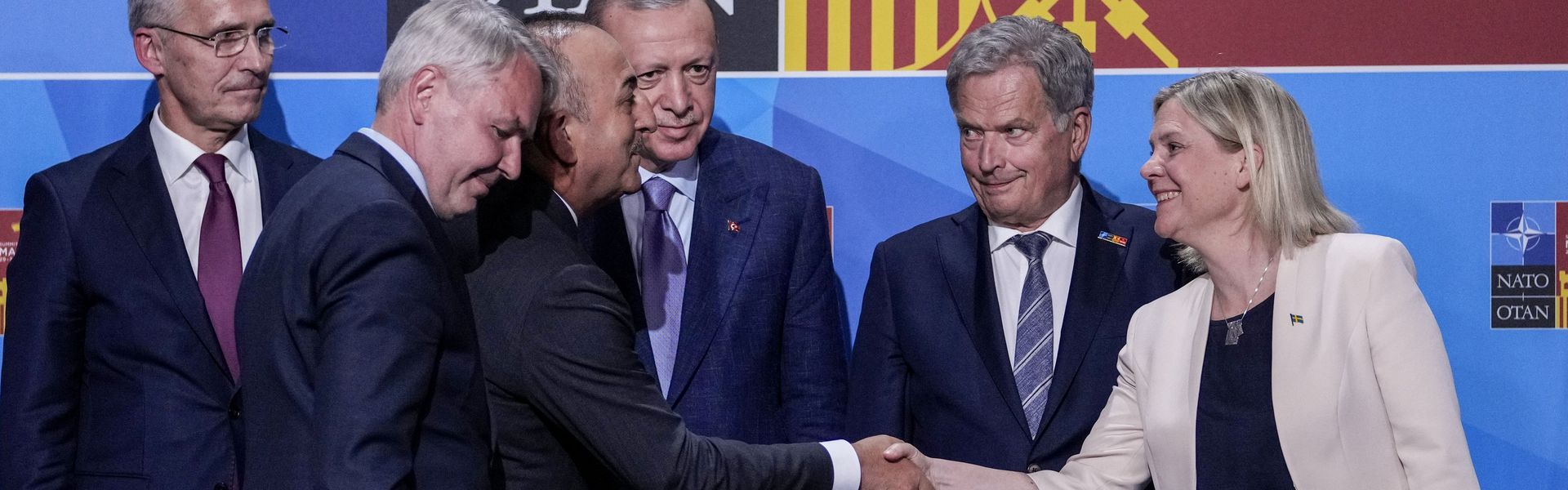 Turkish Foreign Minister Mevlut Cavusoglu, Sweden's Prime Minister Magdalena Andersson, Turkish President Recep Tayyip Erdogan, and Finland's President Sauli Niinisto after Turkey agreed to both countries’ accession to NATO in Madrid, June 28, 2022.