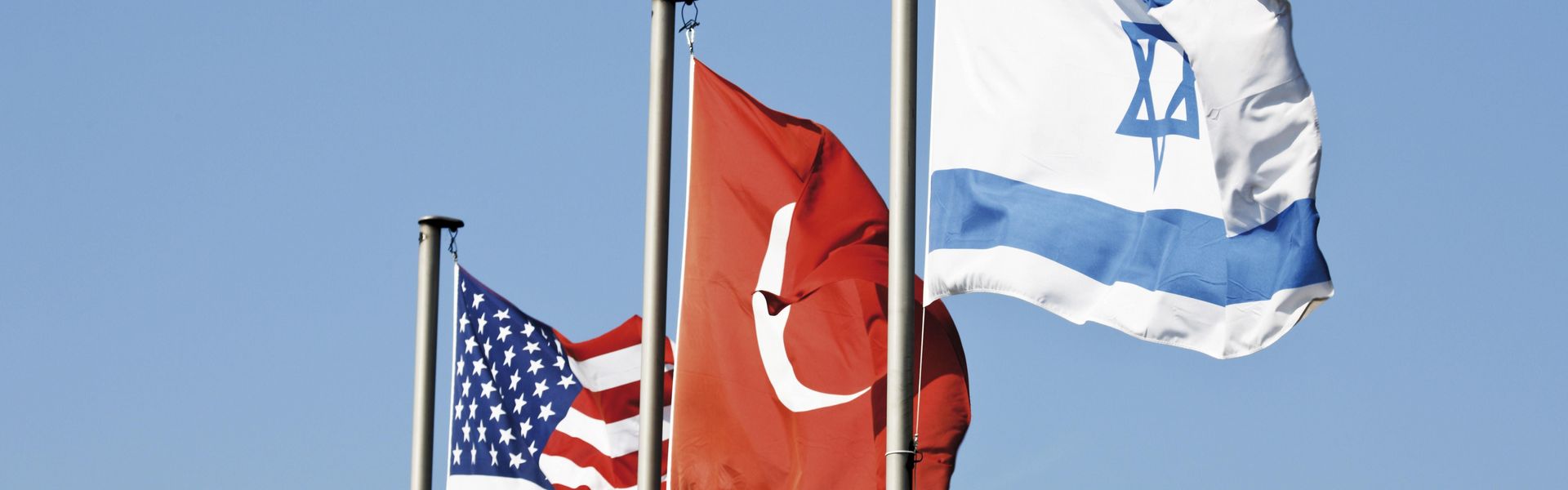 A display of flags: USA, Turkey, Israel
