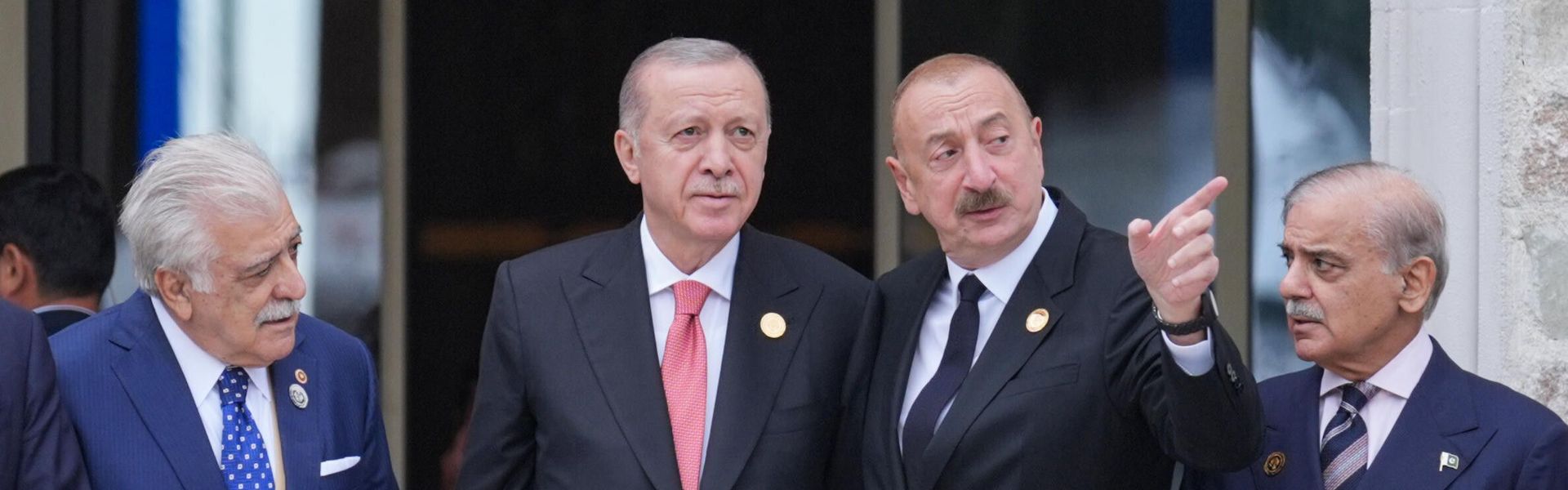 Turkish President Erdogan, Azerbaijani President Aliyev, and Pakistani Prime Minister Sharif pose for a photo at the end of the 17th ECO Summit in Khankendi, Azerbaijan, on July 4, 2025.