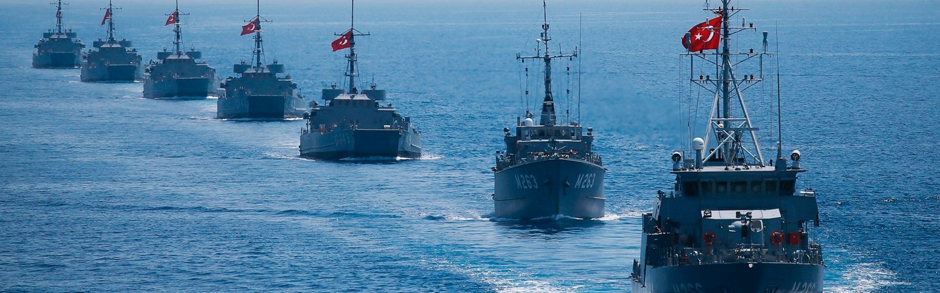 Turkish warships salute people and the drill area after the Efes-2018 Combined Joint Live Fire Exercise in Izmir.