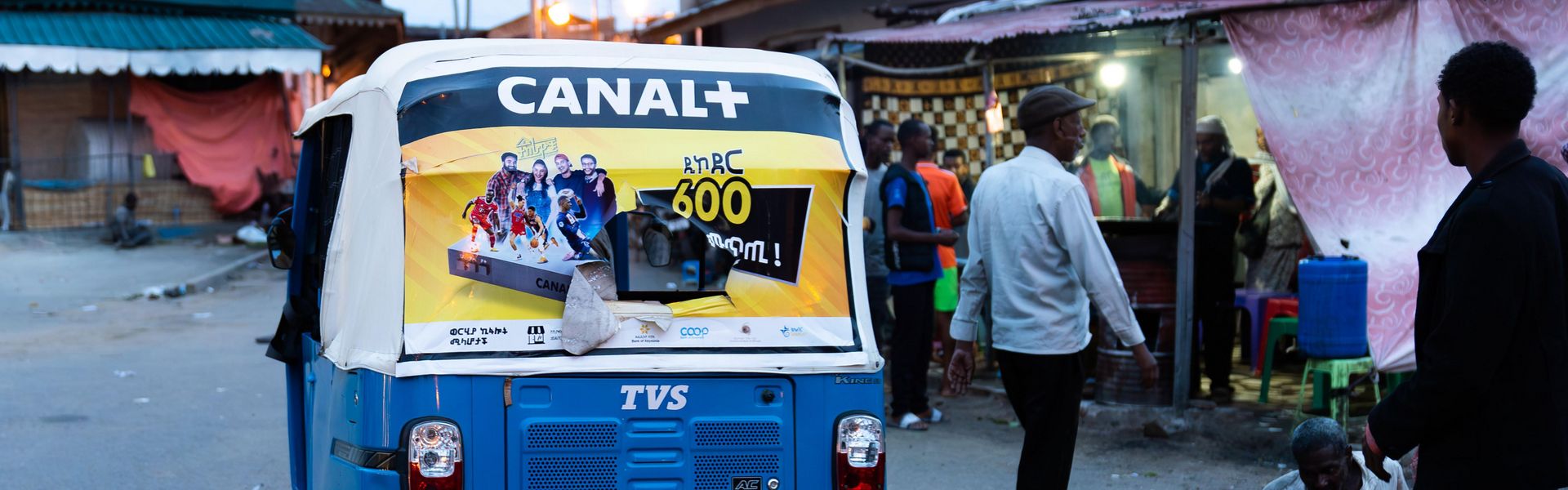 Ethiopian tuk tuk taxi with canal plus advertising, Harari Region, Harar, Ethiopia. 