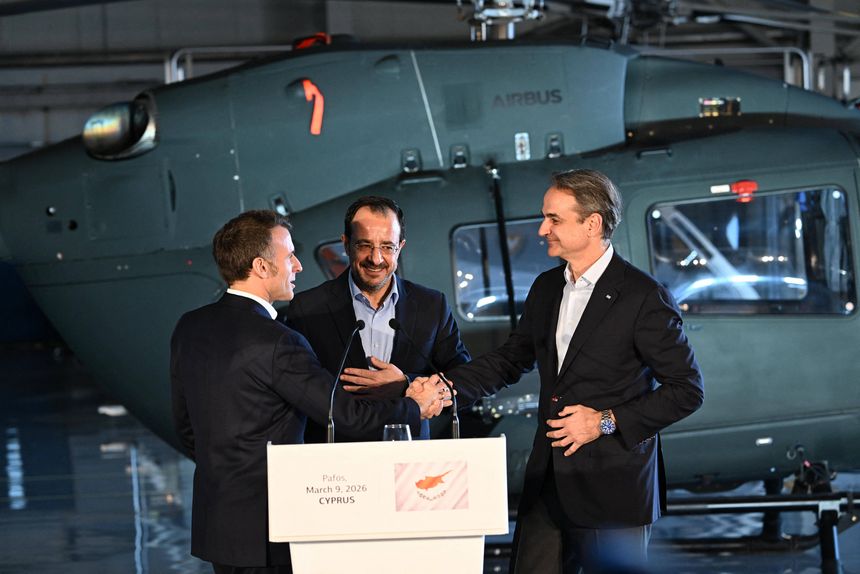 Three men shaking hands